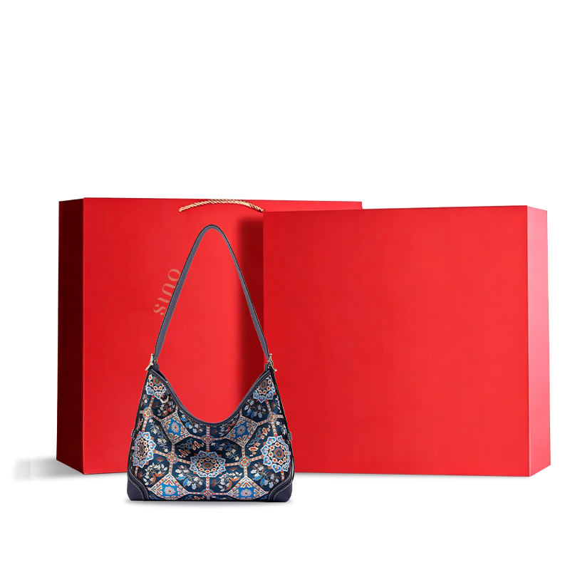 Luxury Song Brocade Blue Baoxiang Floral Crossbody Bag displayed with gift box, perfect for gifting.