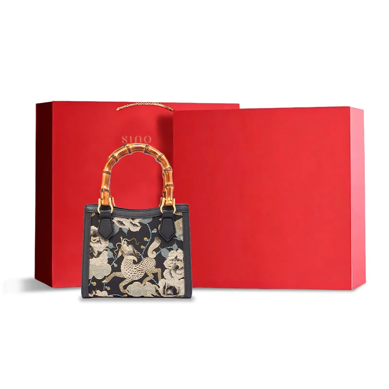 Song Brocade Qilin Peony bamboo handle handbag with elegant gift packaging for women and special occasions.
