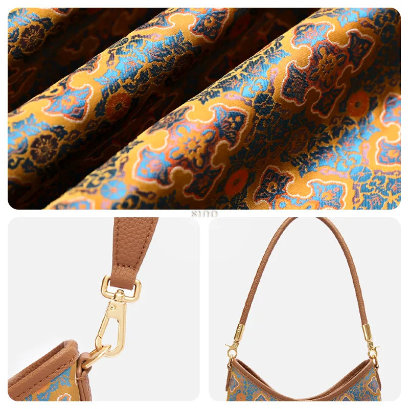 Close-up of the traditional Ruyi motif on Song Brocade with woven blue and gold details, brown leather strap, and gold-tone hardware.