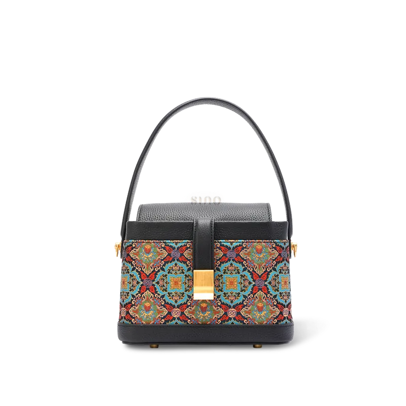 Front view: Song brocade scrolling foliage lotus crossbody bag.