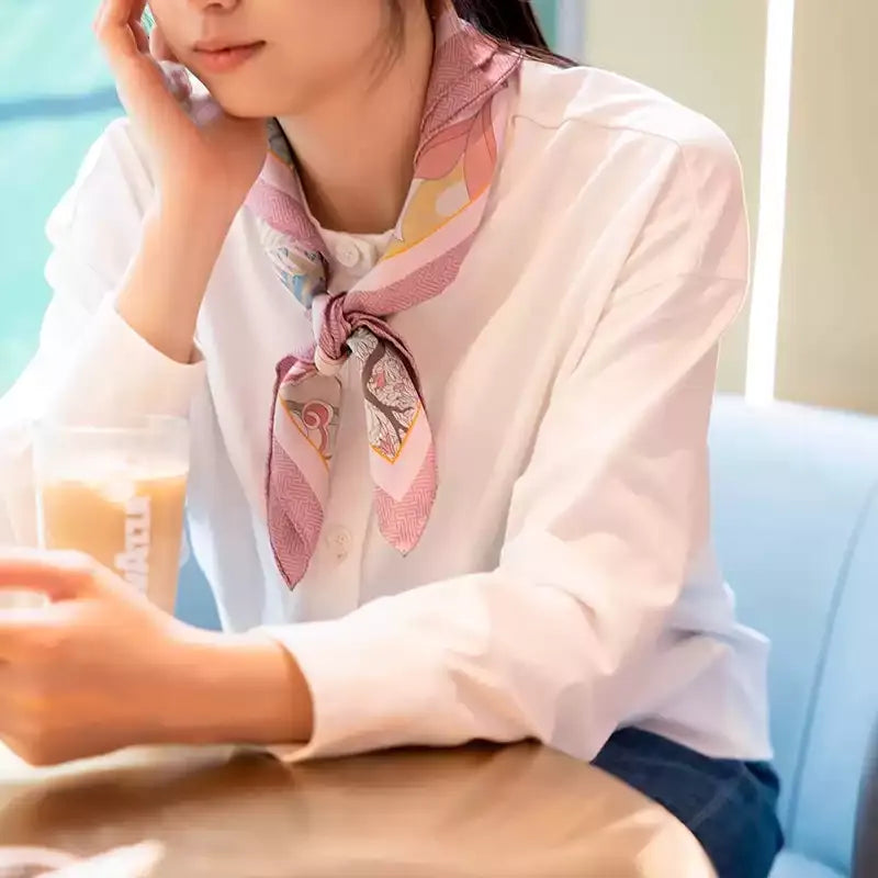 Luxury Nanjing Brocade Spring Floral Vase silk square scarf tied around the neck, styled with a white blouse for an elegant look.