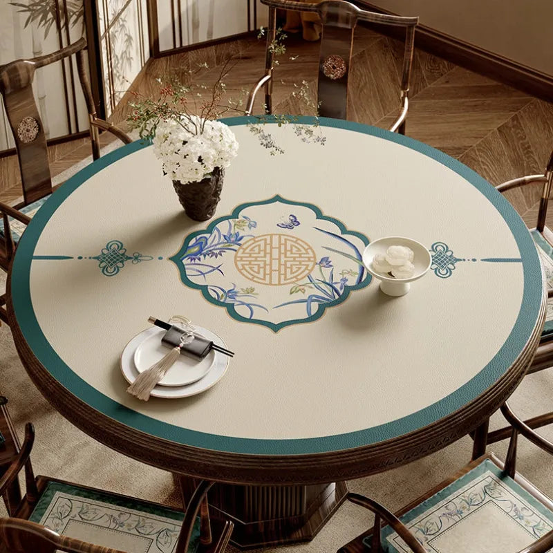 Summer blue round leather table mat with longevity medallion.