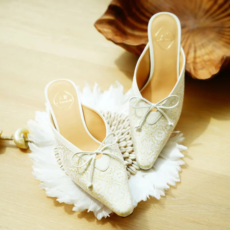 White Song Brocade luxury mule heels for women featuring traditional textile artistry and elegant craftsmanship.