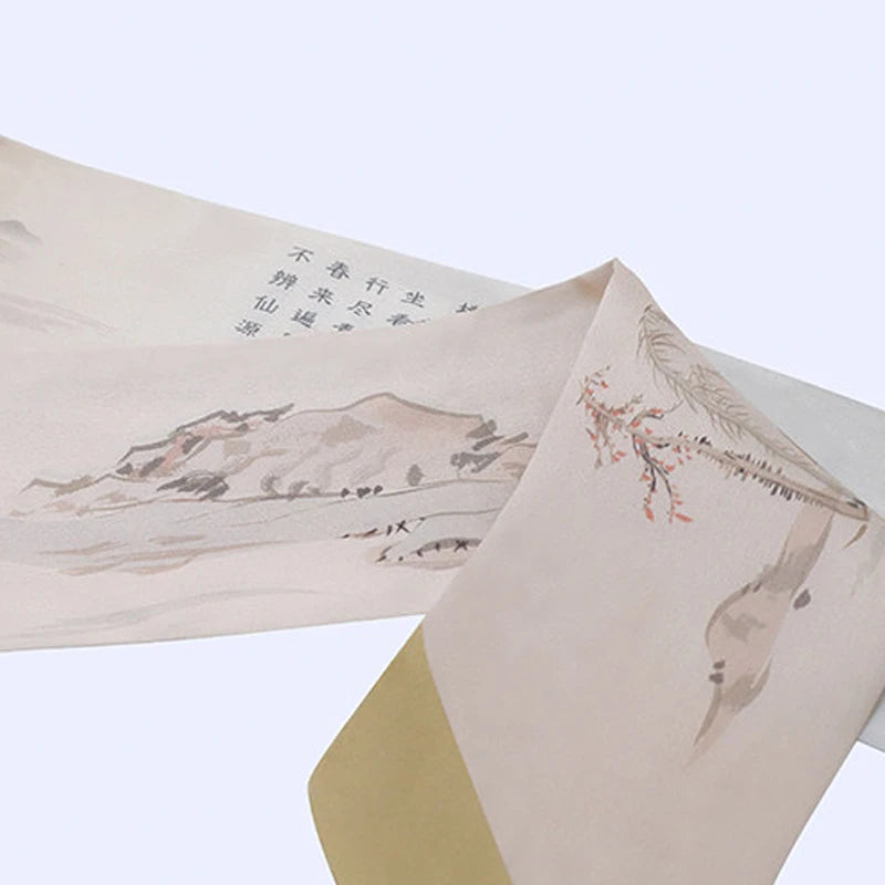 Detailed view of the Wuling Retreat mulberry silk twilly, highlighting fine landscape illustration and elegant color blocking.