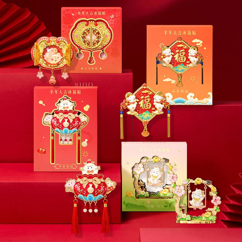 Collection of four Year of the Goat fridge magnet designs with matching red and pastel gift packaging for Chinese New Year gifting and home decor.