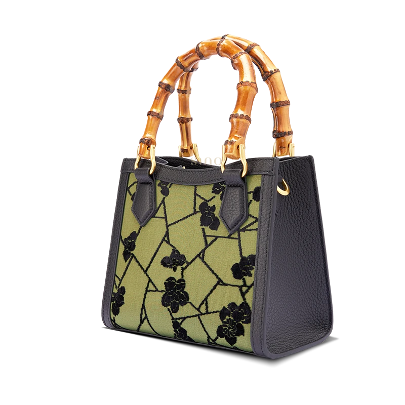 Front view of Zhangrong Silk Velvet Cracked Ice Plum Blossom handbag with mulberry silk panel and full-grain leather construction.