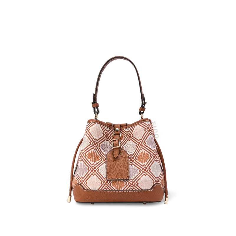 Front view: Zhuang brocade chrysanthemum meander bucket bag.