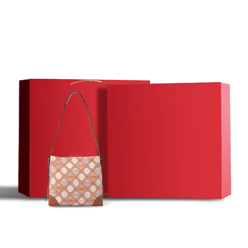 Brown bag in red gift box.